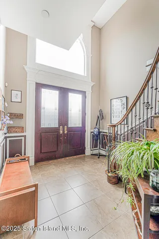 a view of entryway livingroom and hall