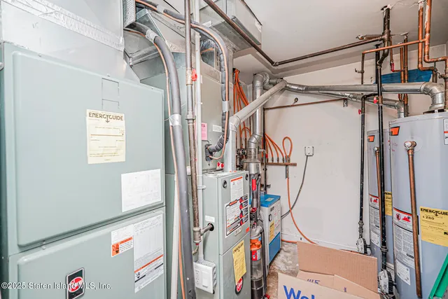 a view of a pathway with flower plants