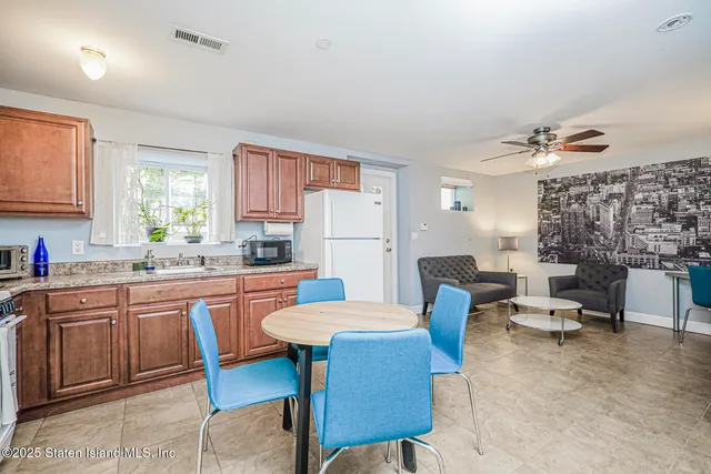 a view of a house with entertaining space