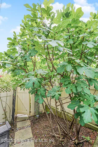 a picture of a bathroom with a shower