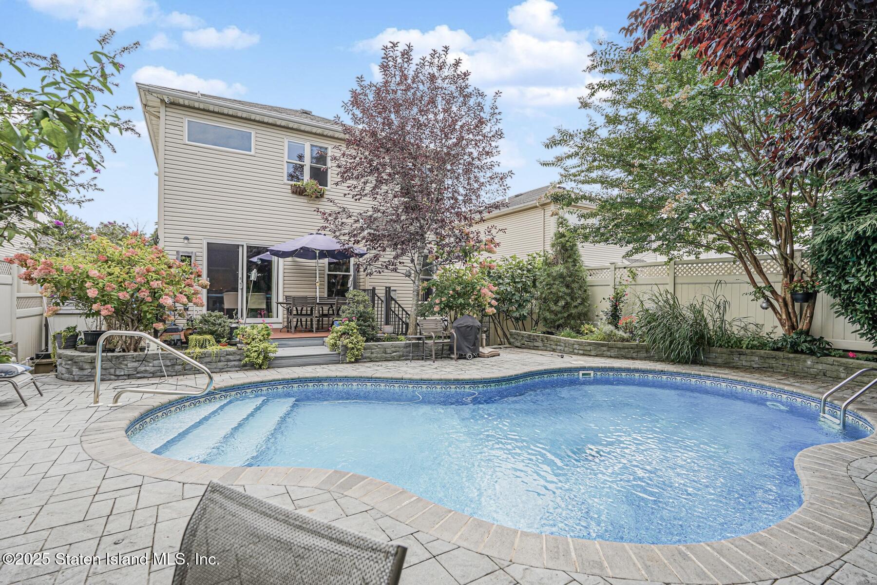 28 Brookside Loop Staten Island, NY 10309 - Photo 51 of 60 a view of a house with entertaining space