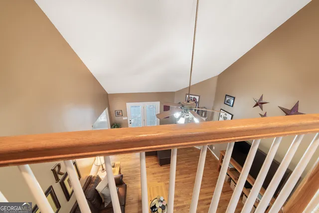 a spacious bedroom with a bed and window