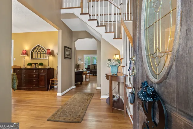 a view of a entryway door and interior of the house