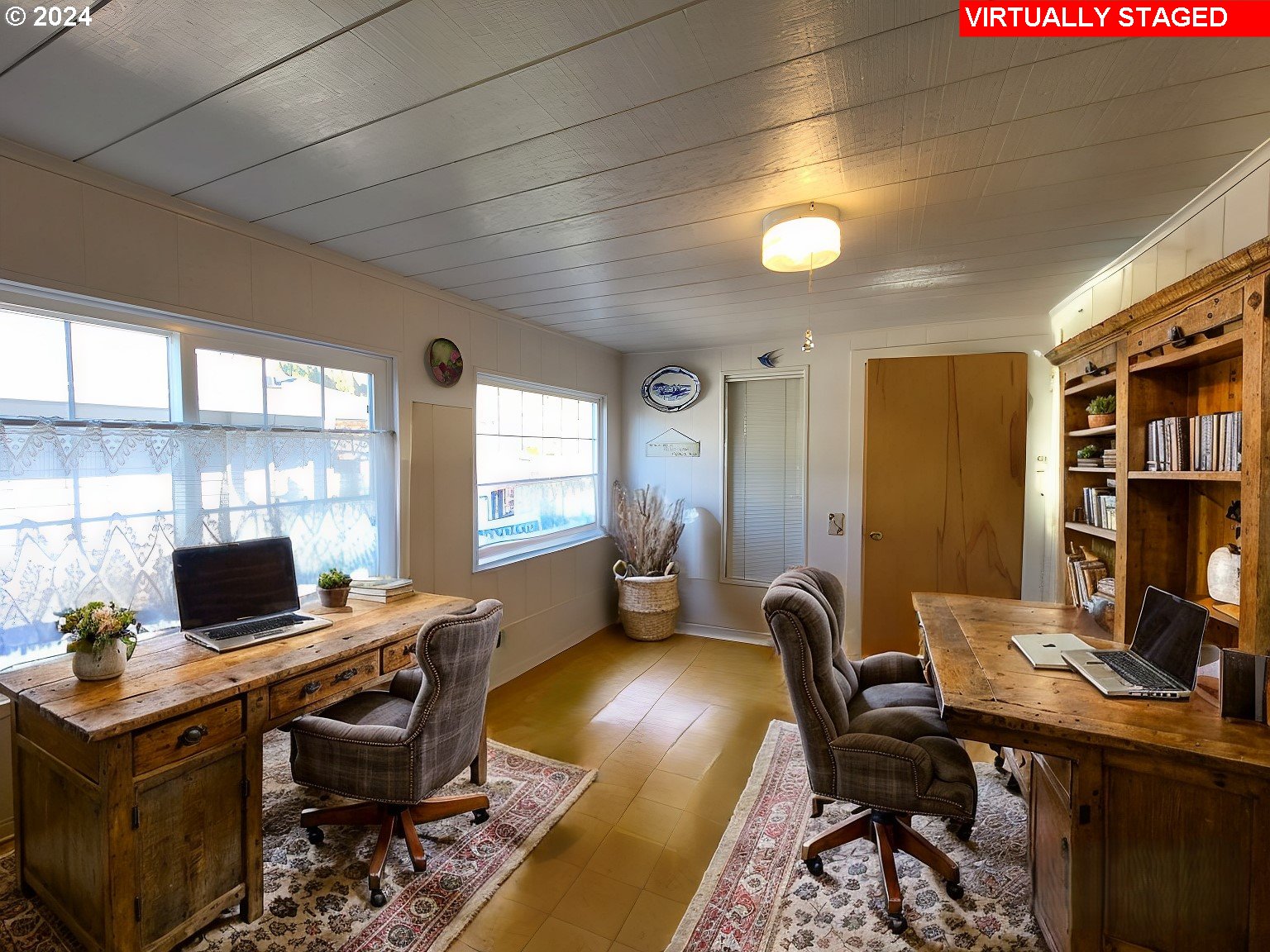 1936 H Street Springfield, OR 97477 - Photo 13 of 26 a view of a workspace with furniture and a window
