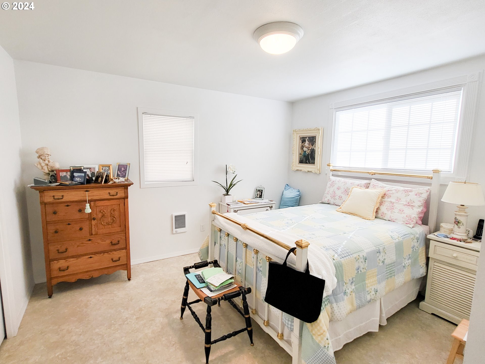 1936 H Street Springfield, OR 97477 - Photo 10 of 26 a bedroom with a bed and a dresser