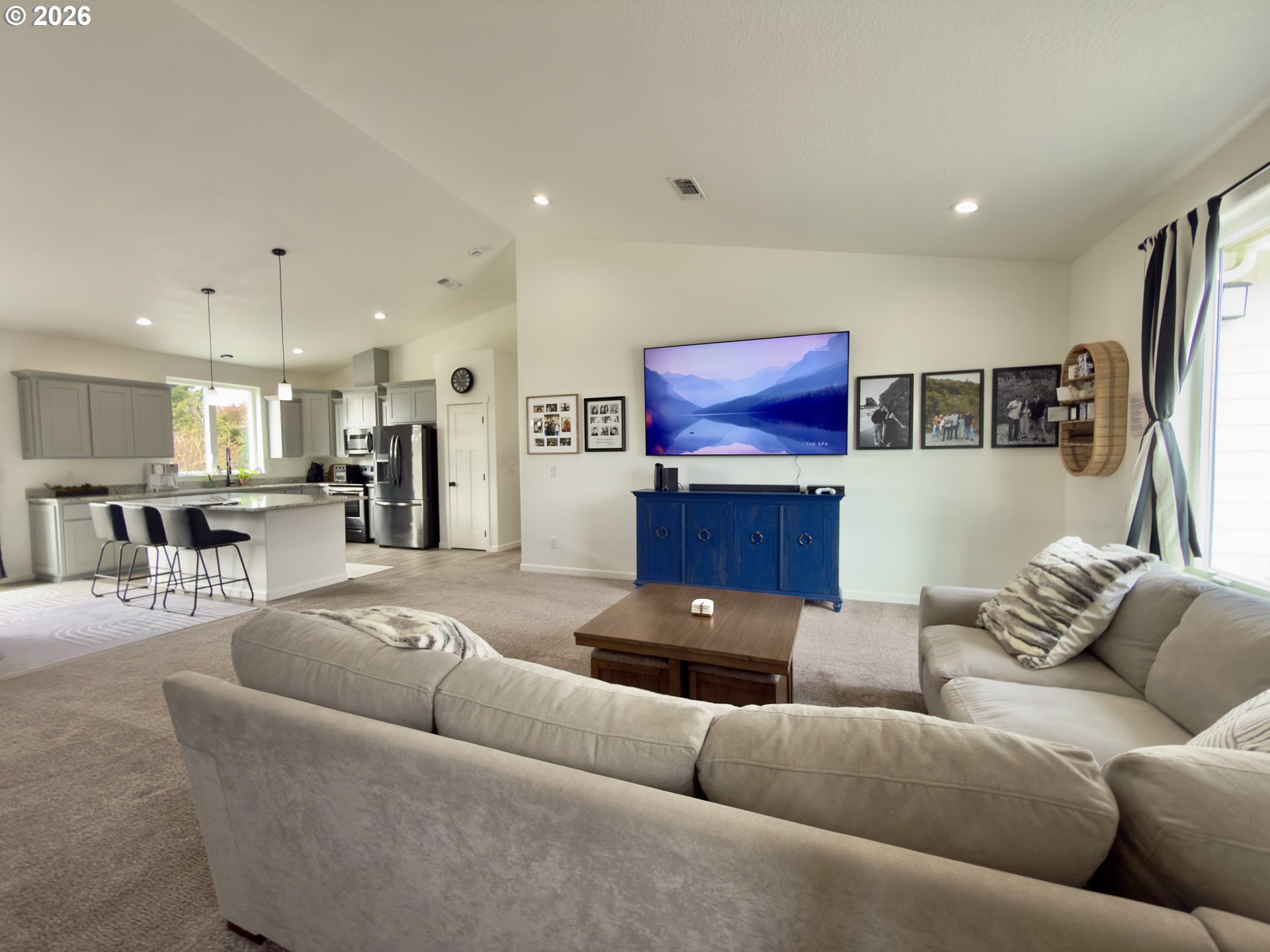 7205 Edge Cliff Drive Brookings, OR 97415 - Photo 14 of 30 a living room with furniture and kitchen view