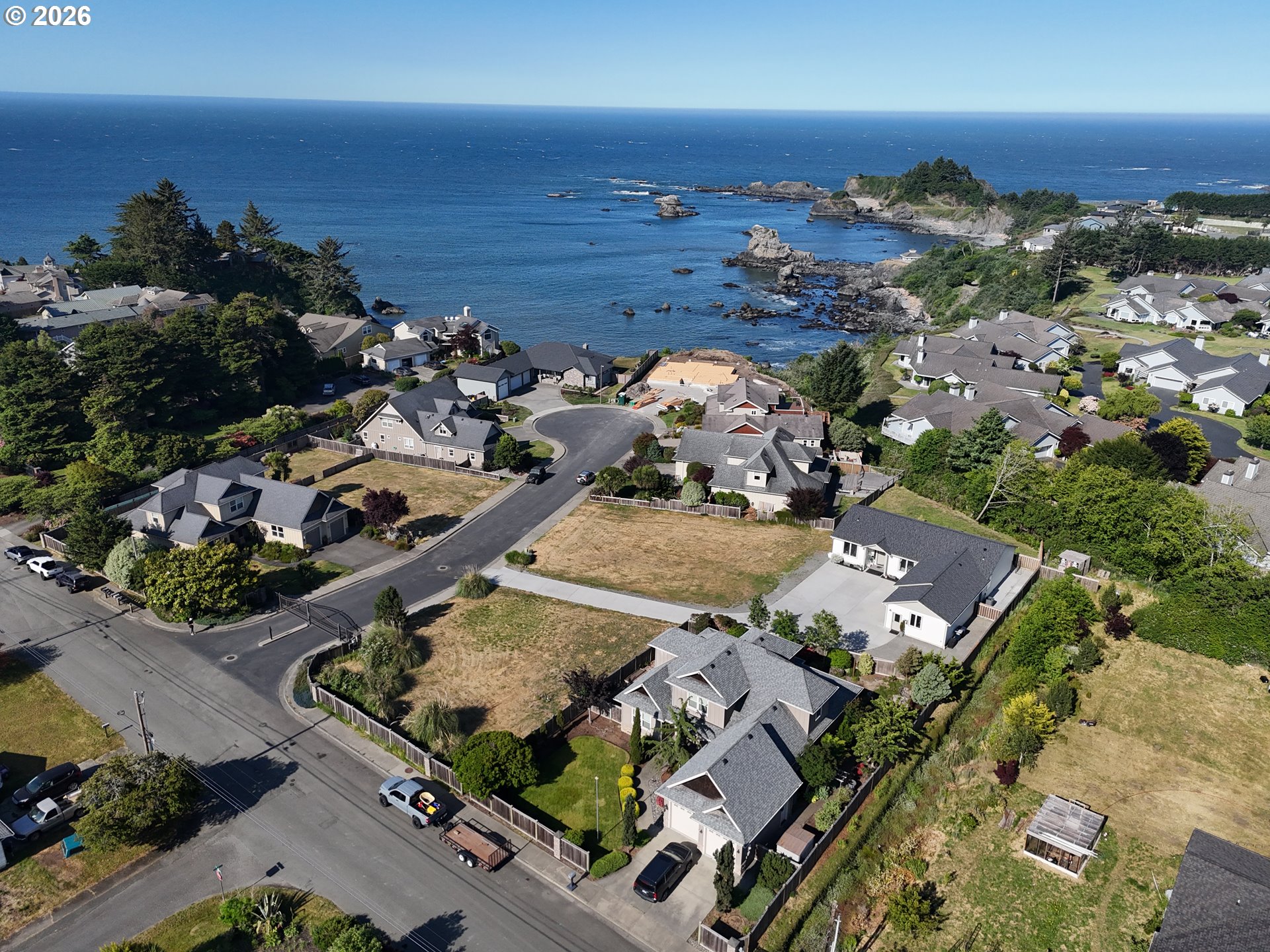7205 Edge Cliff Drive Brookings, OR 97415 - Photo 2 of 30 an aerial view of residential houses with outdoor space