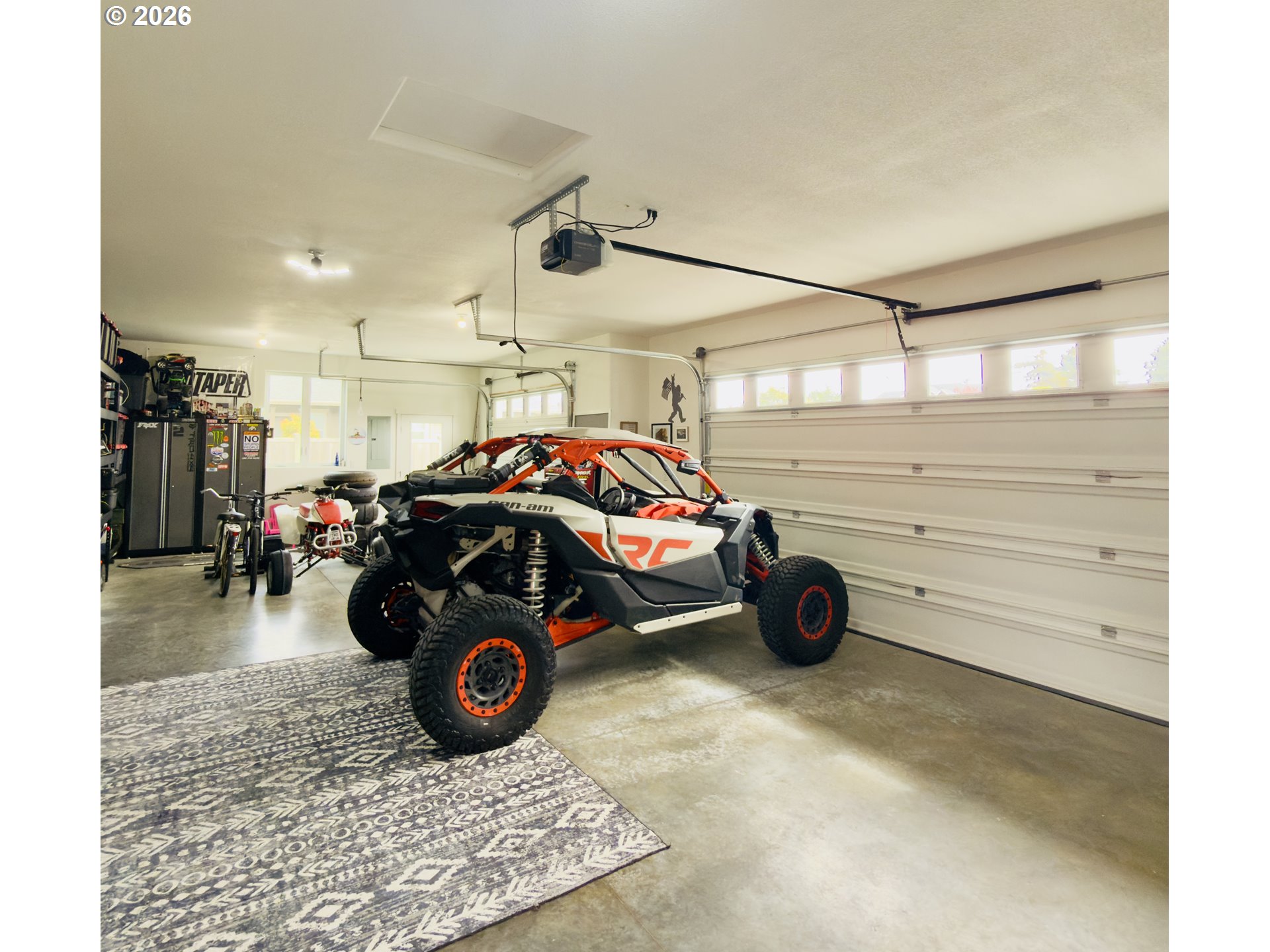 7205 Edge Cliff Drive Brookings, OR 97415 - Photo 24 of 30 a car parked in a garage