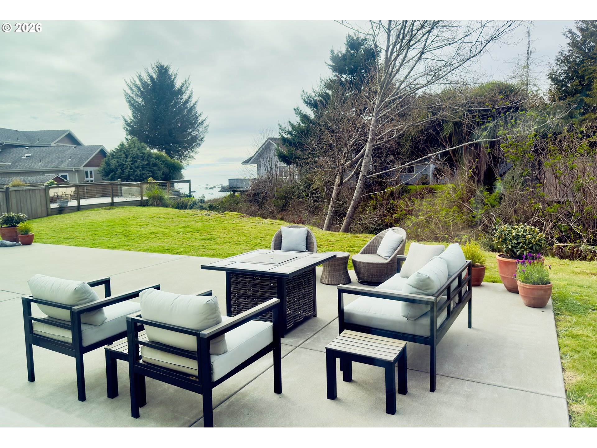 7205 Edge Cliff Drive Brookings, OR 97415 - Photo 30 of 30 a view of a chairs and table in the patio