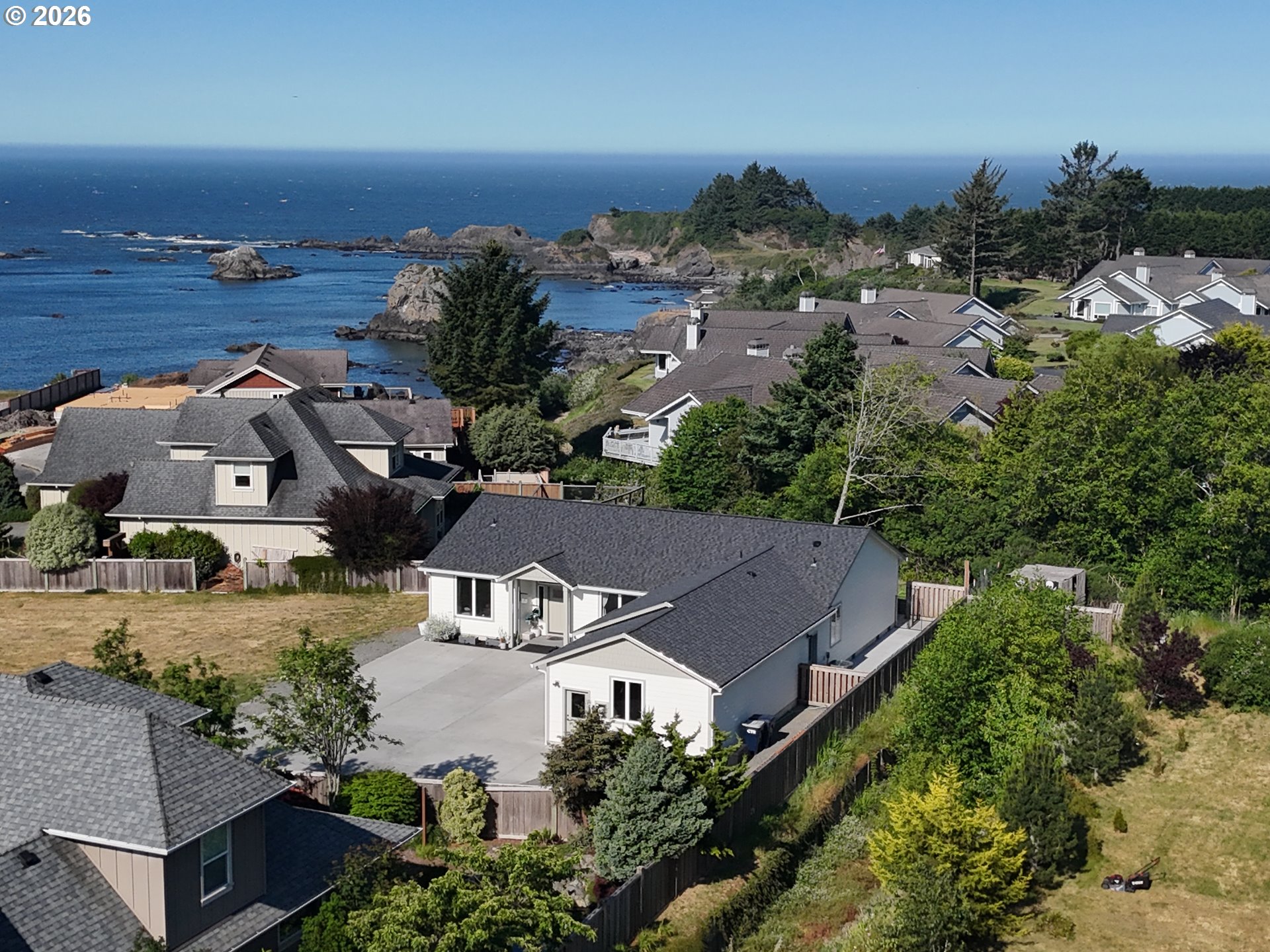7205 Edge Cliff Drive Brookings, OR 97415 - Photo 3 of 30 an aerial view of a house with yard swimming pool and outdoor seating