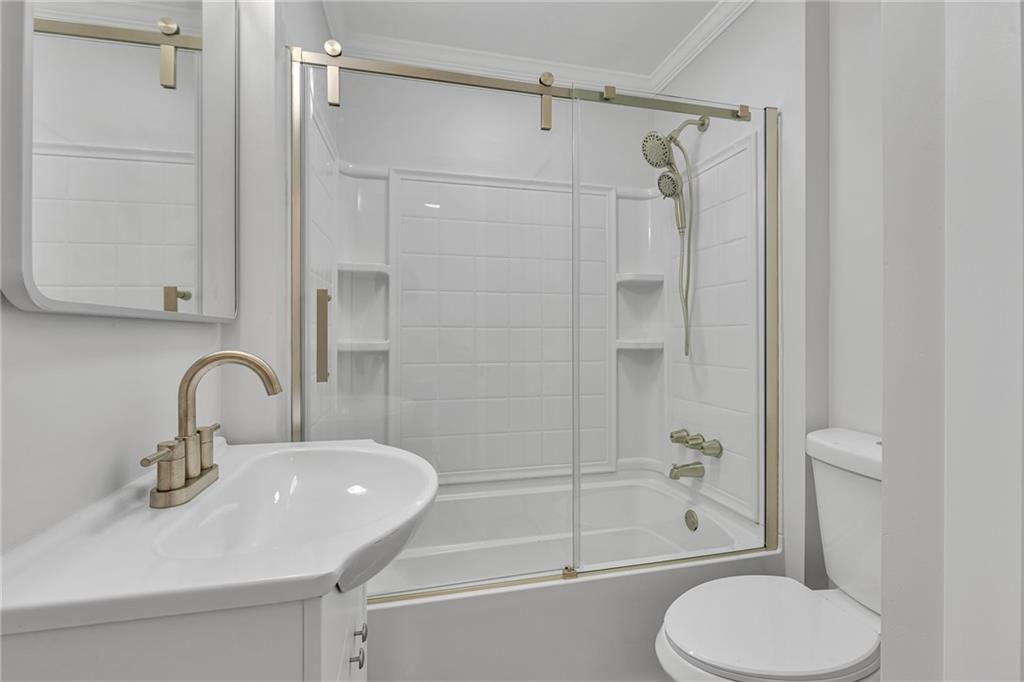 1526 Elgin Street Aliquippa, PA 15001 - Photo 11 of 33 a bathroom with a sink toilet and shower