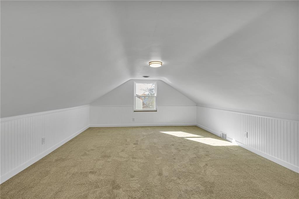 1526 Elgin Street Aliquippa, PA 15001 - Photo 15 of 33 an empty room with a empty space and windows