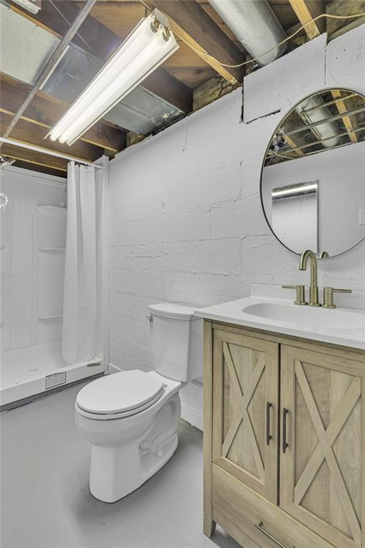 1526 Elgin Street Aliquippa, PA 15001 - Photo 19 of 33 a bathroom with a toilet a sink and mirror