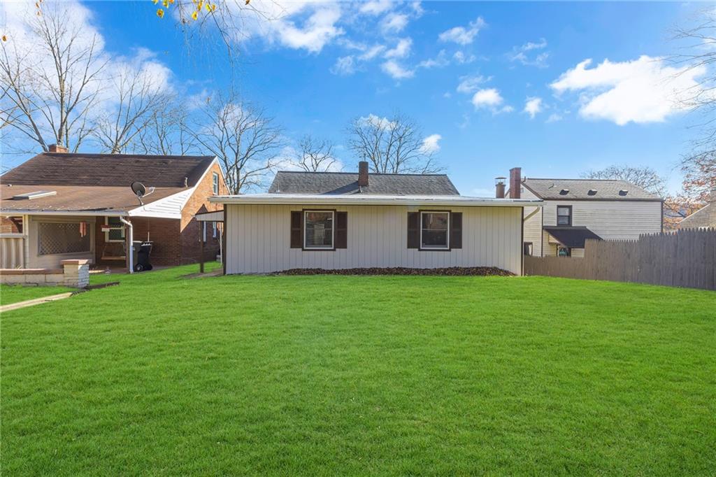 1526 Elgin Street Aliquippa, PA 15001 - Photo 24 of 33 a view of a house with a backyard