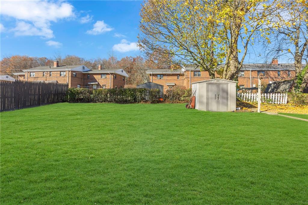 1526 Elgin Street Aliquippa, PA 15001 - Photo 25 of 33 a view of a house with a yard