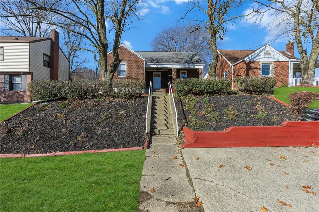 1526 Elgin Street Aliquippa, PA 15001 - Photo 27 of 33 a view of a house with a yard