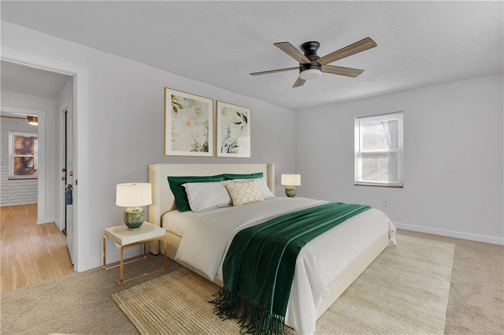 1526 Elgin Street Aliquippa, PA 15001 - Photo 28 of 33 a bedroom with a bed and window