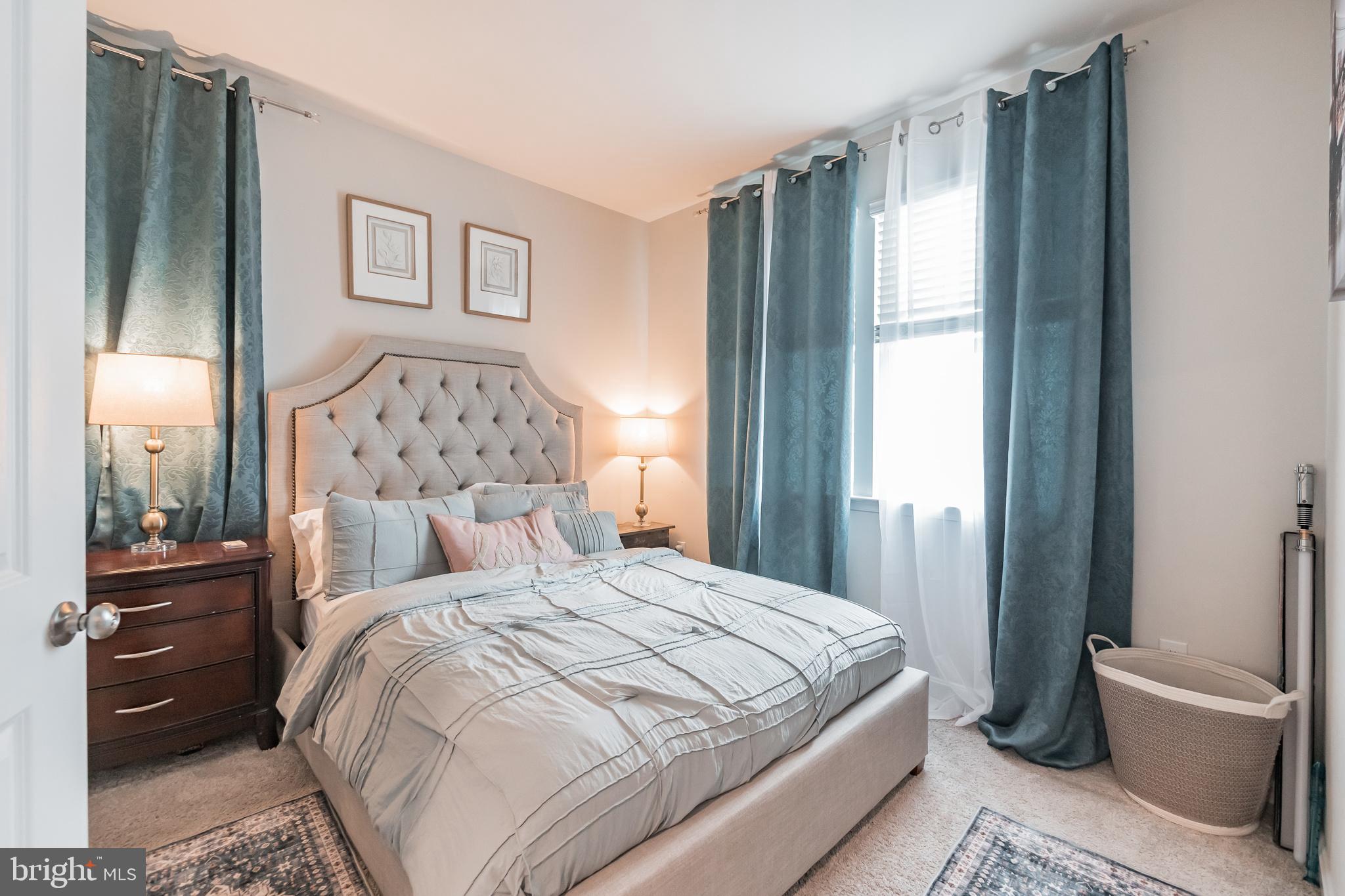 7041 Freedom Way Frederick, MD 21703 - Photo 11 of 32 a bedroom with a large bed and a window