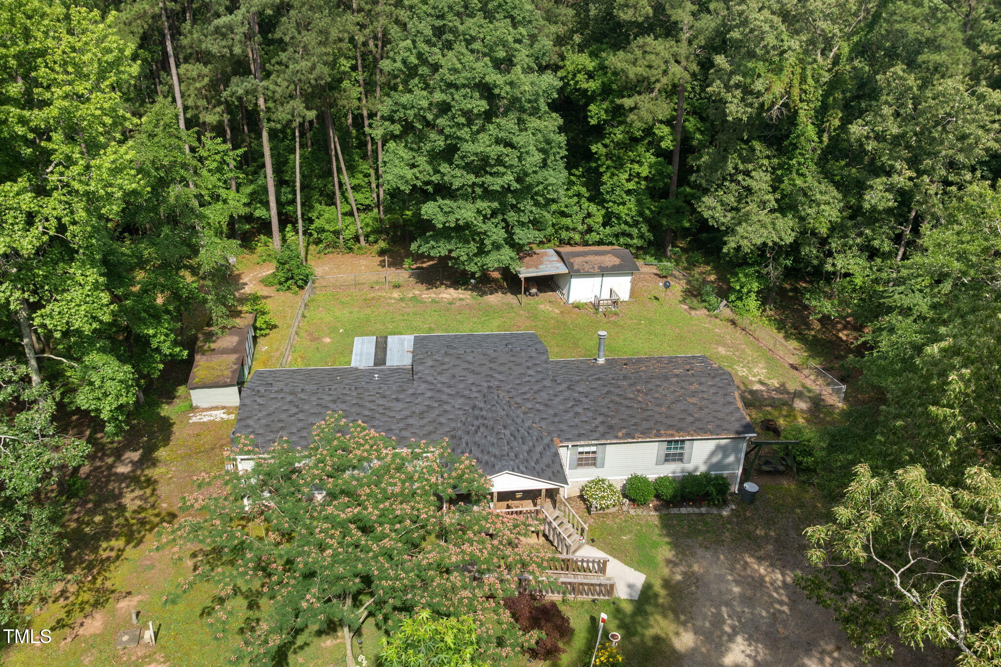 7571 Highway 751 Durham, NC 27713 - Photo 8 of 11 an aerial view of a house with a yard