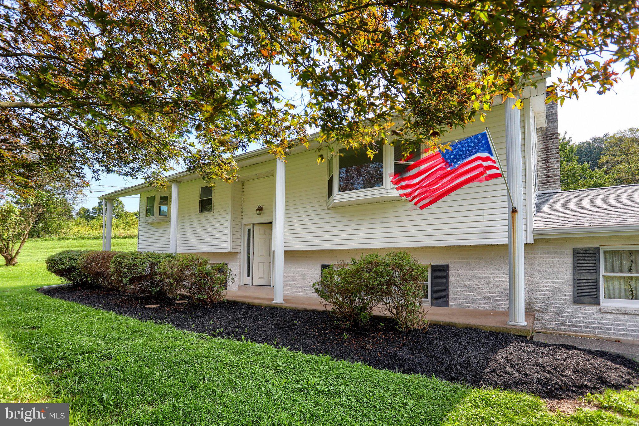 7620 Spring Road New Bloomfield, PA 17068 - Photo 7 of 49 COVERED PORCH