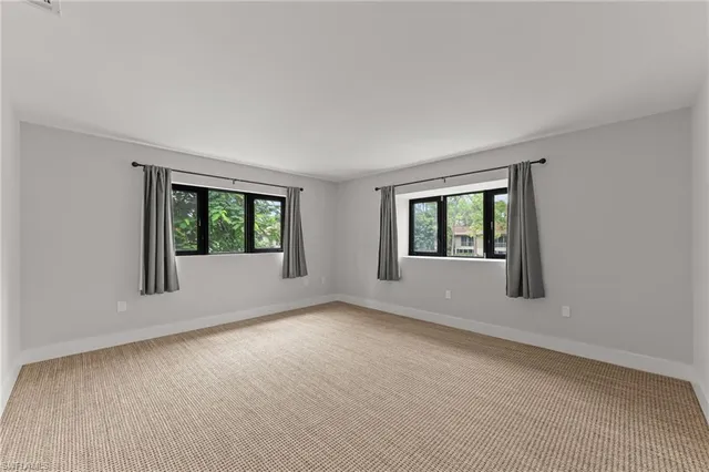 a bathroom with a shower and toilet