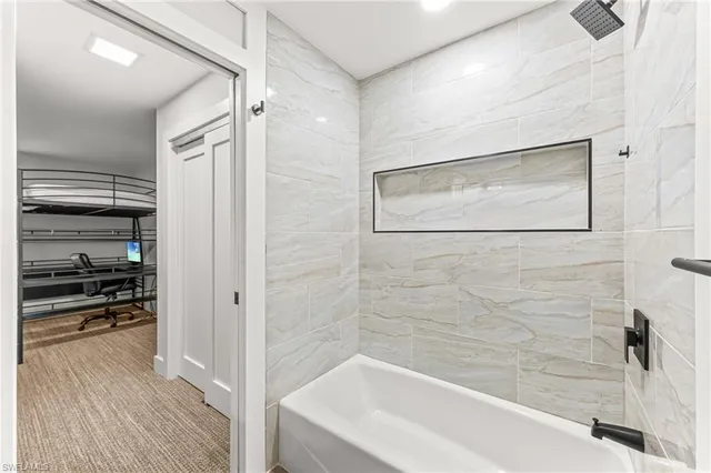 a bathroom with a sink a mirror and toilet