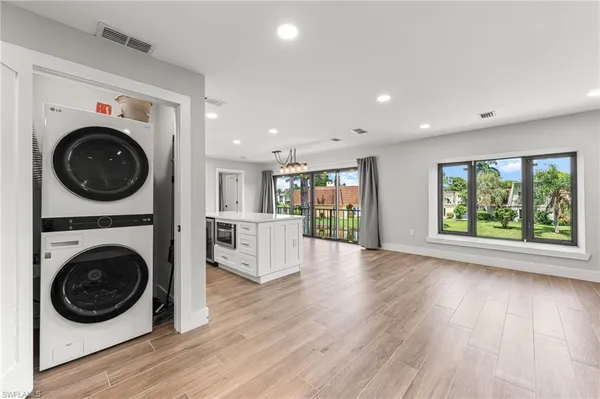 a bathroom with a tub and shower