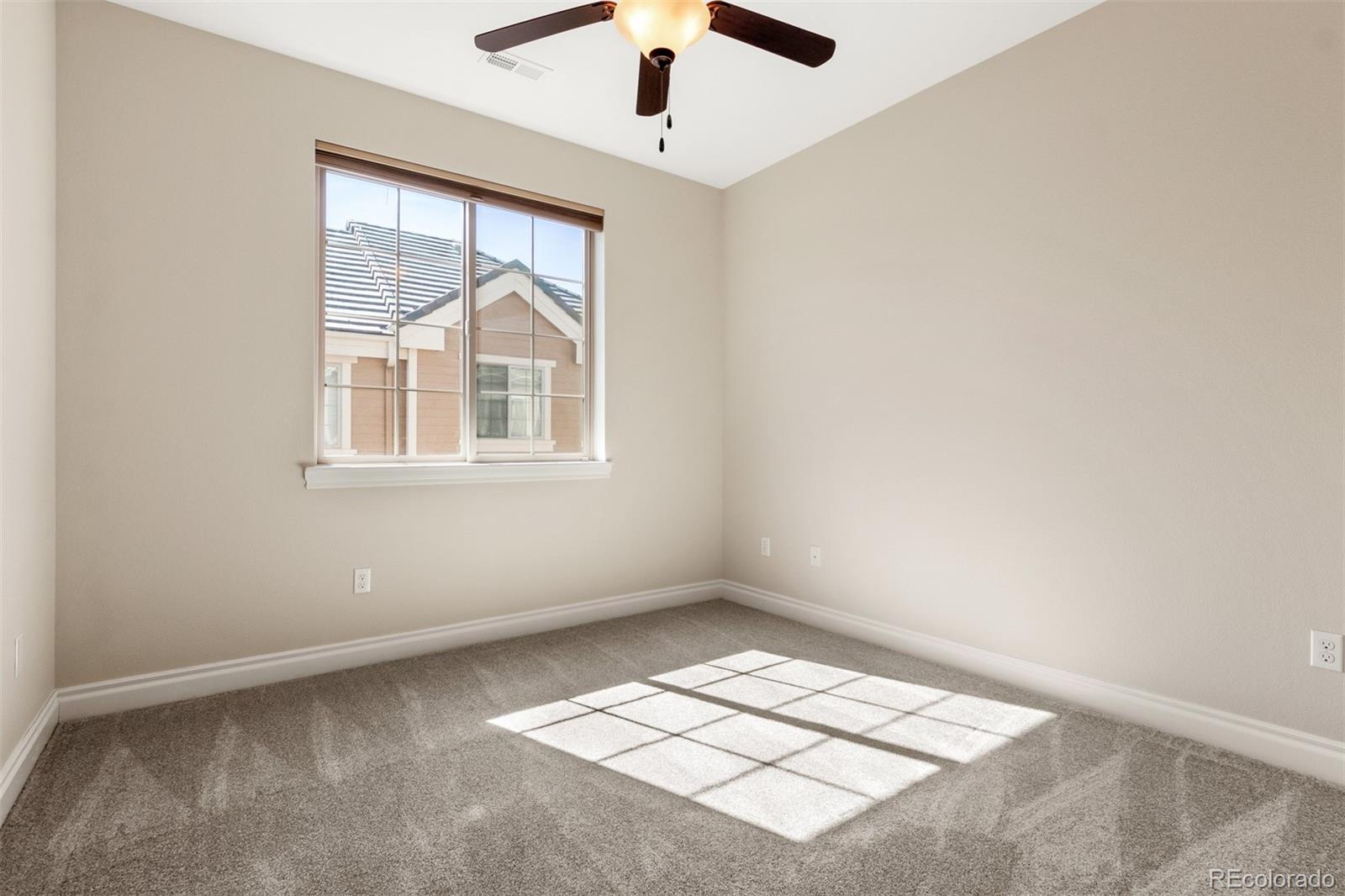 9256 Mornington Way Lone Tree, CO 80124 - Photo 28 of 36 an empty room with a window