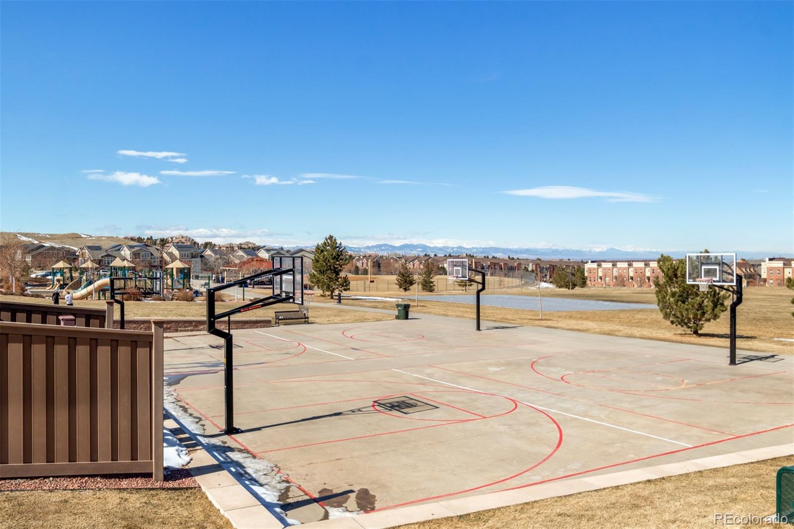 9256 Mornington Way Lone Tree, CO 80124 - Photo 34 of 36 a view of a swimming pool and an outdoor seating