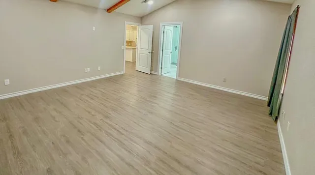 a view of a room with an empty space