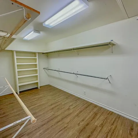 a bathroom with 2 sink and a mirror