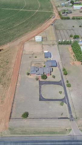 a view of a yard with an ocean view