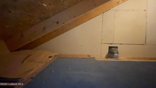 a bathroom with a white bath tub a shower and a sink