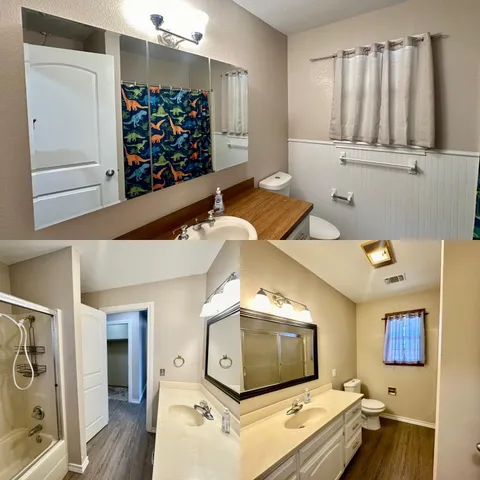 a bathroom with a tub sink shower and mirror