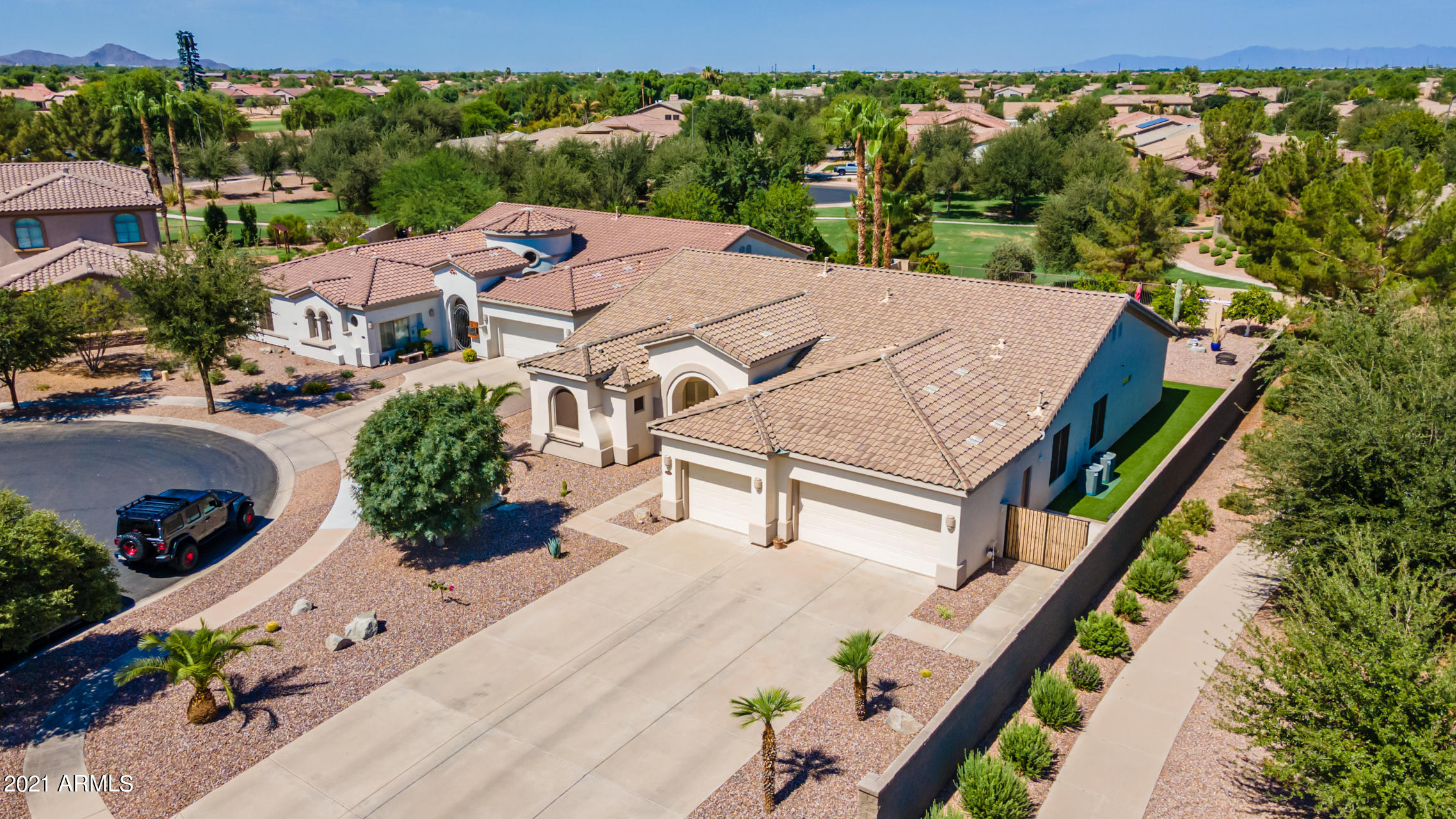 4648 South Ranger Court Gilbert, AZ 85297 - Photo 2 of 49 an aerial view of a house with a yard