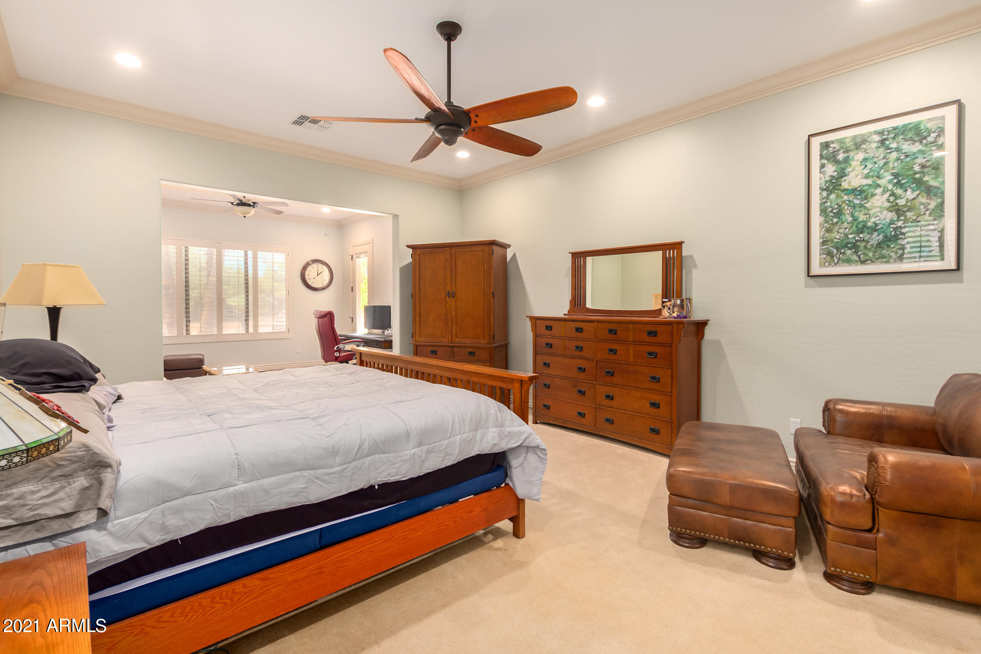 4648 South Ranger Court Gilbert, AZ 85297 - Photo 29 of 49 a bedroom with a bed a couch and dresser