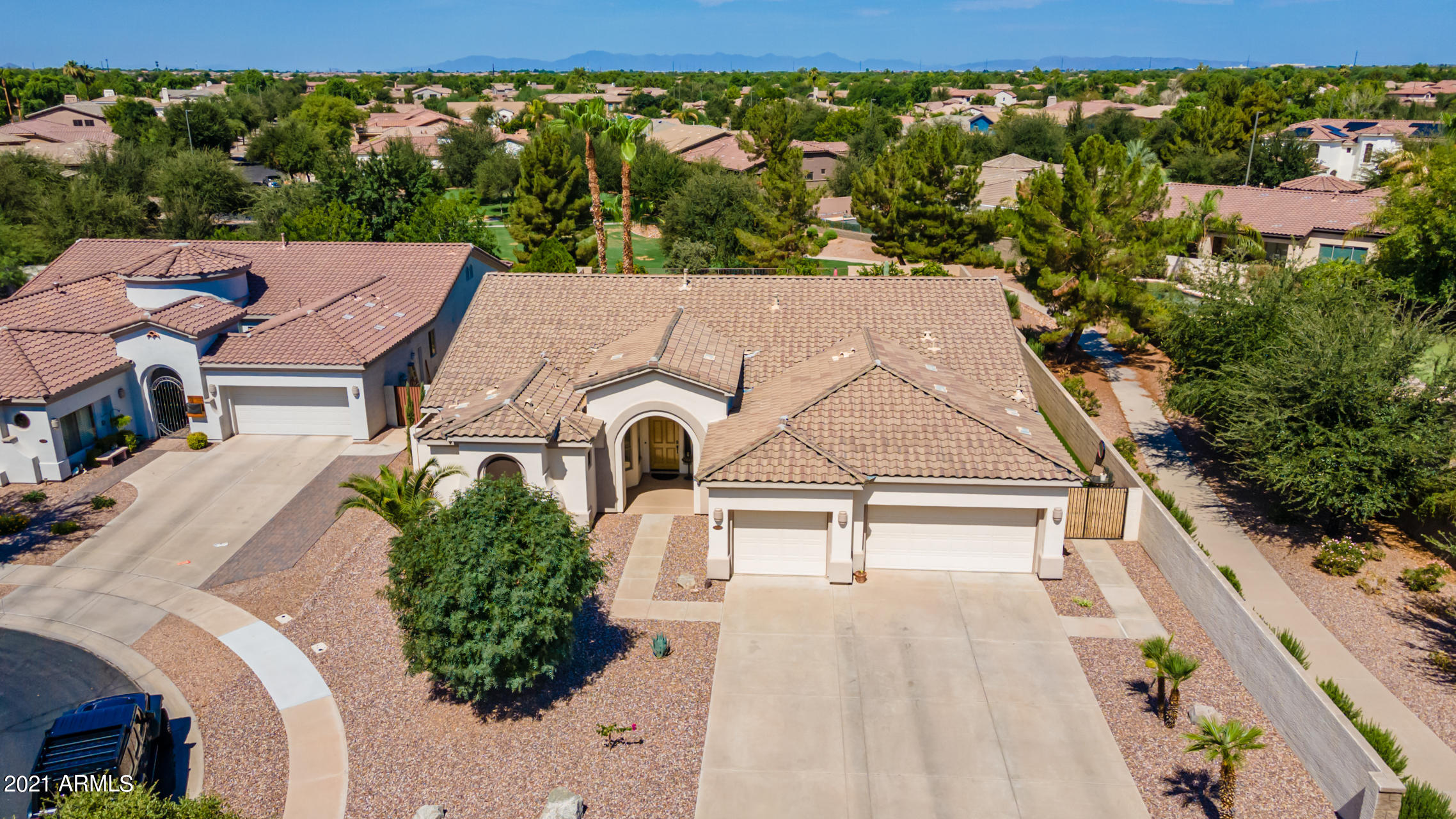 4648 South Ranger Court Gilbert, AZ 85297 - Photo 3 of 49 an aerial view of a house with a garden