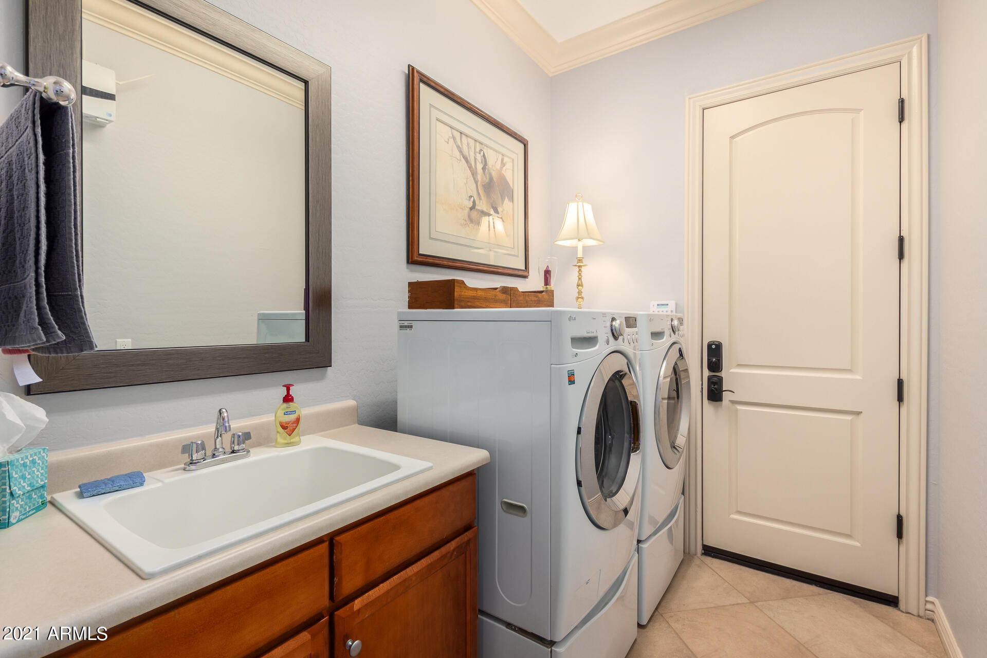 4648 South Ranger Court Gilbert, AZ 85297 - Photo 39 of 49 a utility room with dryer and washer