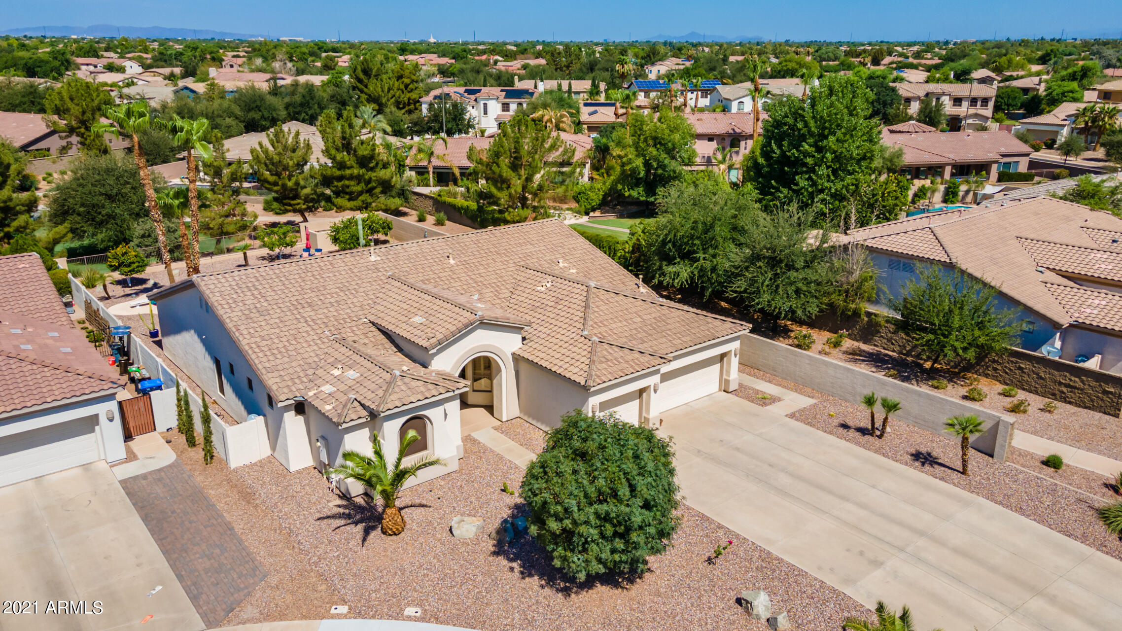 4648 South Ranger Court Gilbert, AZ 85297 - Photo 4 of 49 an aerial view of a house with a yard