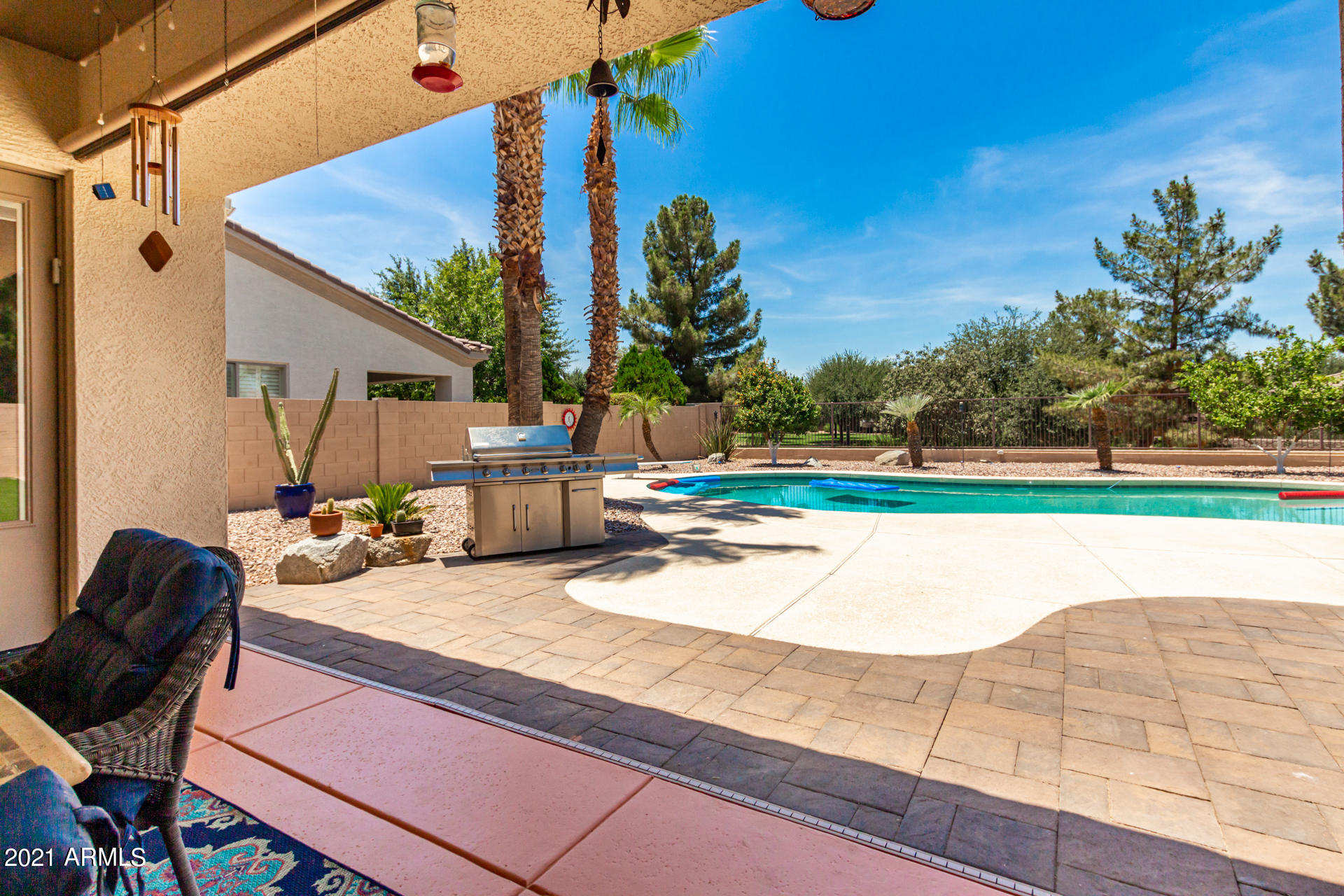 4648 South Ranger Court Gilbert, AZ 85297 - Photo 42 of 49 a view of a chairs and table in the patio