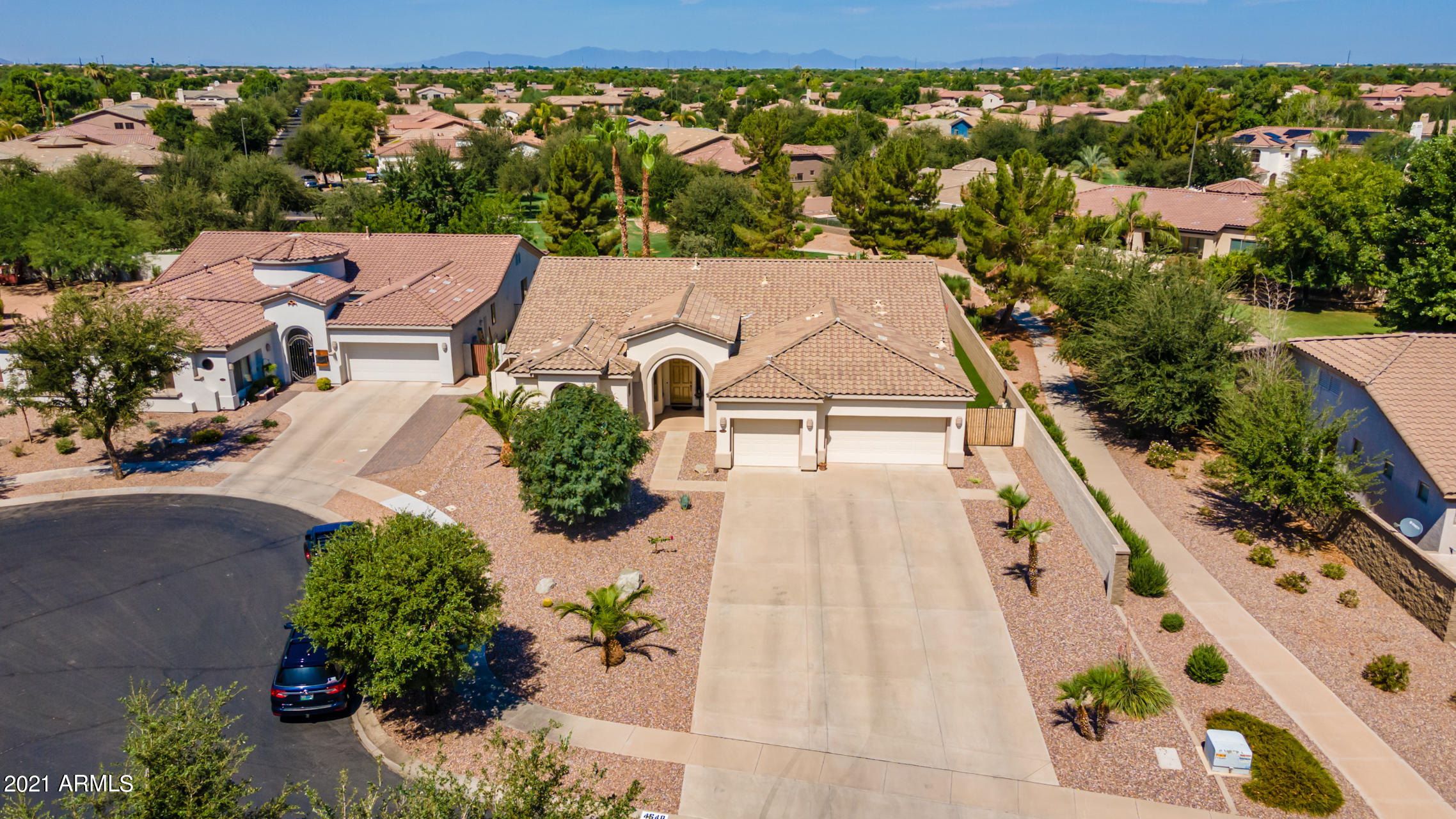 4648 South Ranger Court Gilbert, AZ 85297 - Photo 48 of 49 an aerial view of a house with garden space and street view