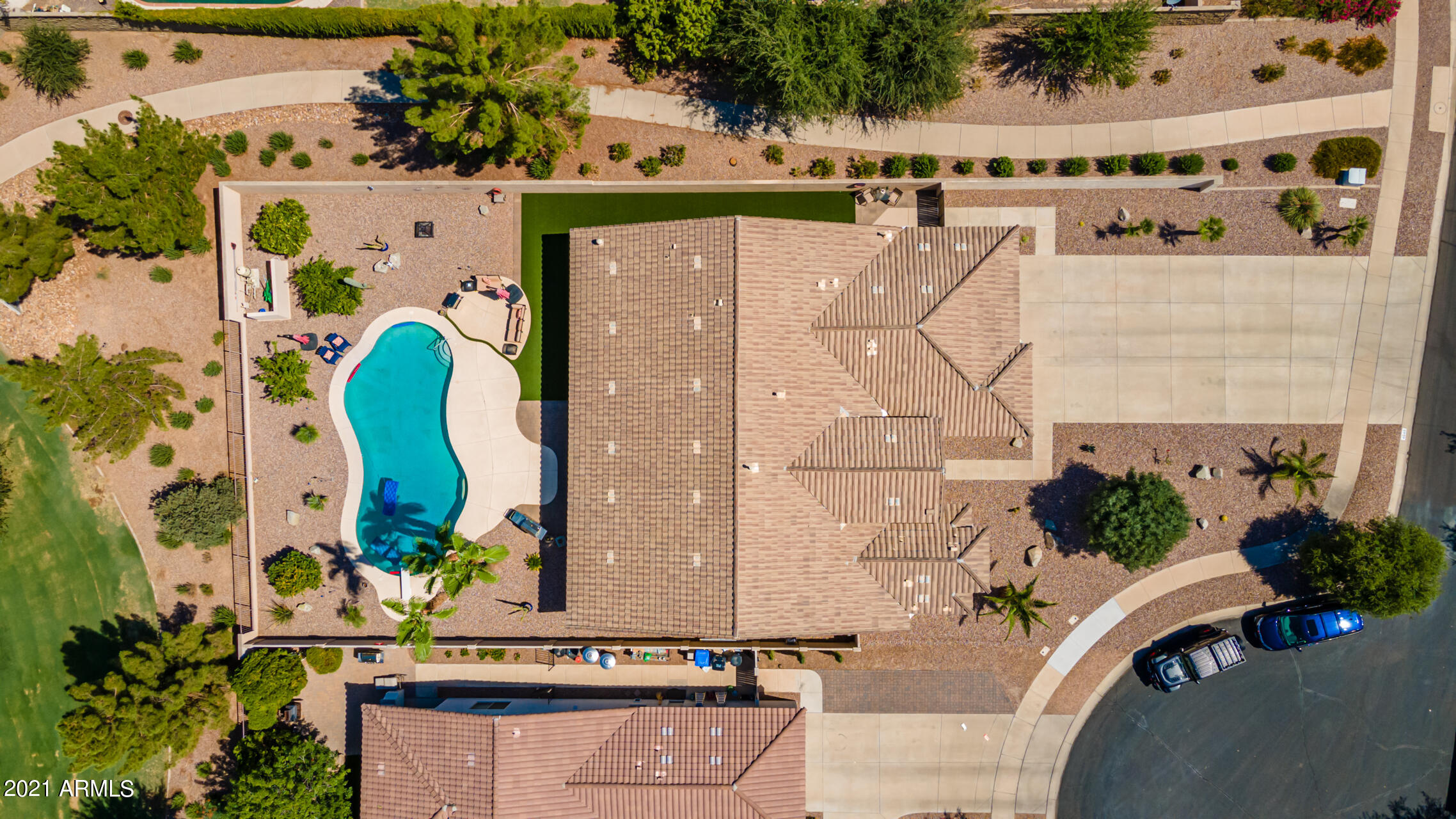 4648 South Ranger Court Gilbert, AZ 85297 - Photo 7 of 49 an aerial view of a house with outdoor space swimming pool