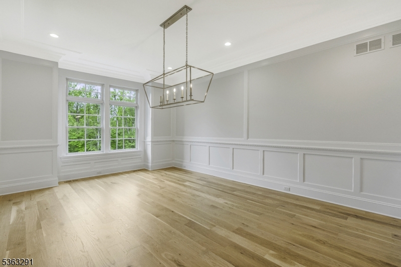 8 Cobblestone Court Warren, NJ 07059 - Photo 11 of 50 a view of an empty room with wooden floor fridge and a window