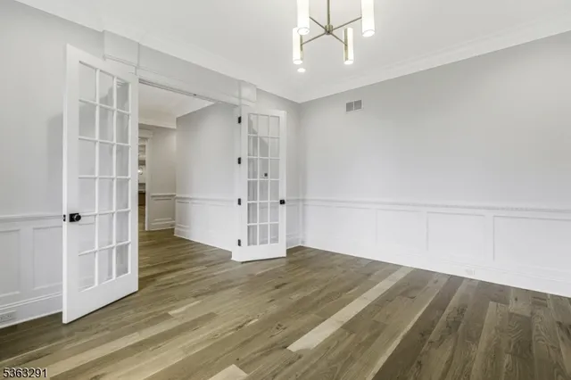 a bathroom with a sink toilet vanity and shower