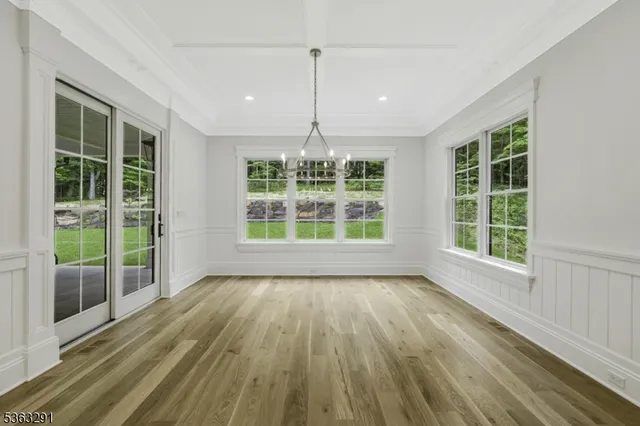 a view of an empty room with a balcony