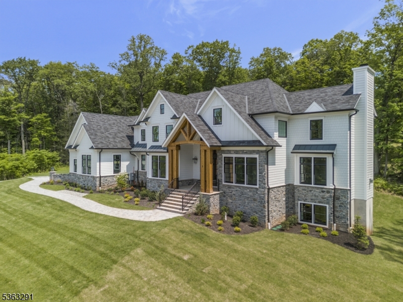 8 Cobblestone Court Warren, NJ 07059 - Photo 3 of 50 a front view of a house with a yard