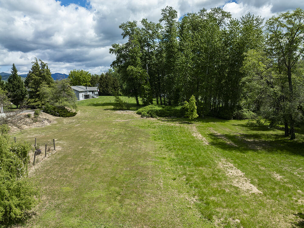 0 Lower River Road, Unit TL#108 Grants Pass, OR 97526 - Photo 19 of 47 a view of a garden with a fountain