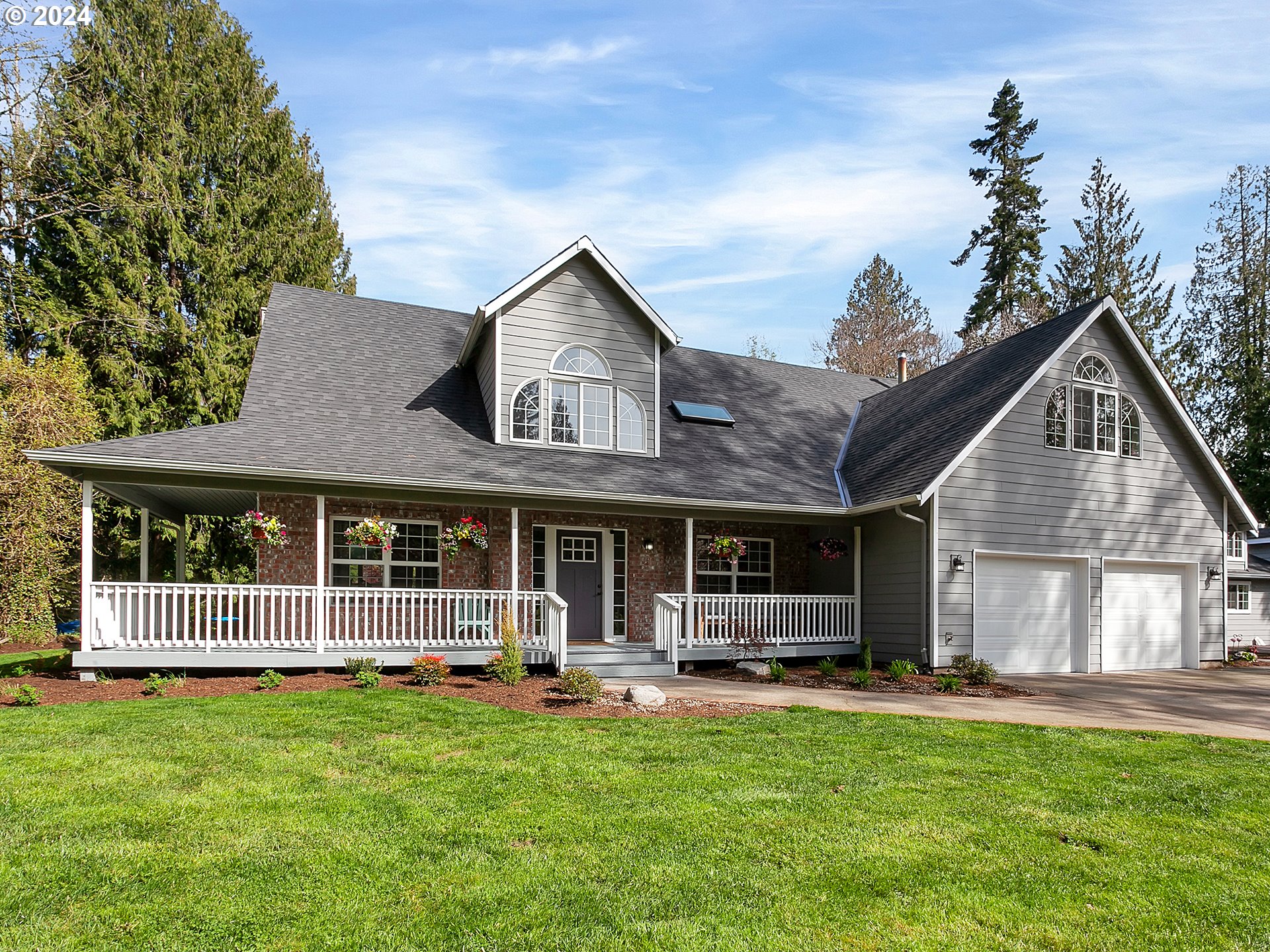 40209 Southeast Fish Hatchery Road Sandy, OR 97055 - Photo 3 of 48 a front view of a house with yard