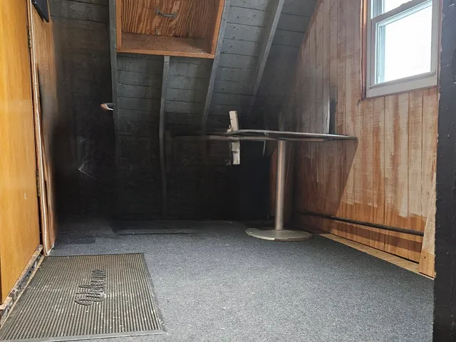 wooden floor and window in a room