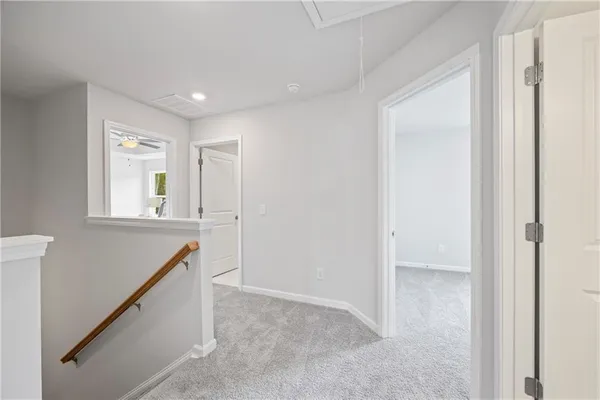 a view of an empty room and window